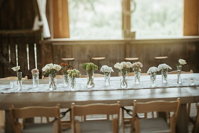 A table set for an event in the barn venue