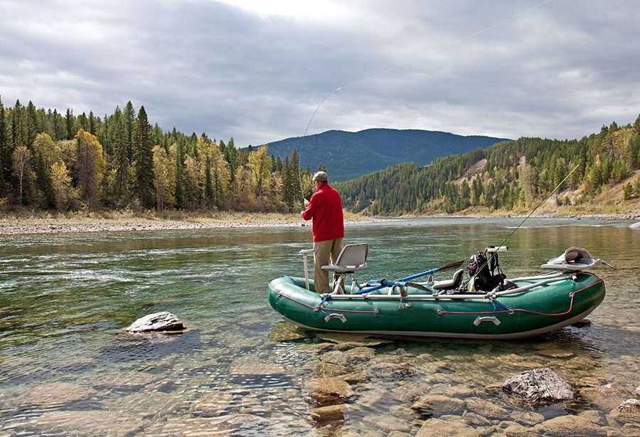 A fly fisherman casting